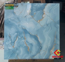 Gạch lát nền 60x60 vân đá marble màu xanh dương phối đường chỉ vàng