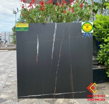 Gạch ốp lát 60x60 đá mờ liên doanh Việt Ấn màu đen vân cam 